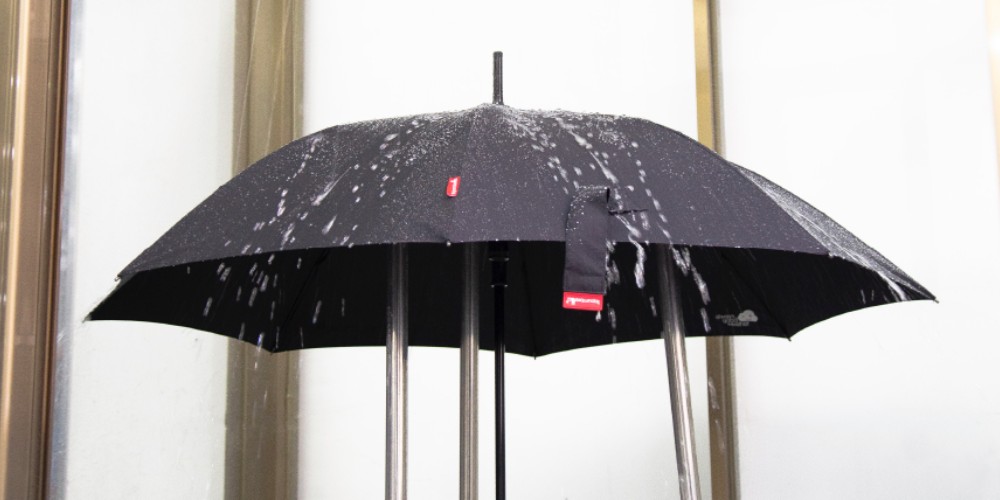 Waterproof performance test on umbrella in in-house lab.