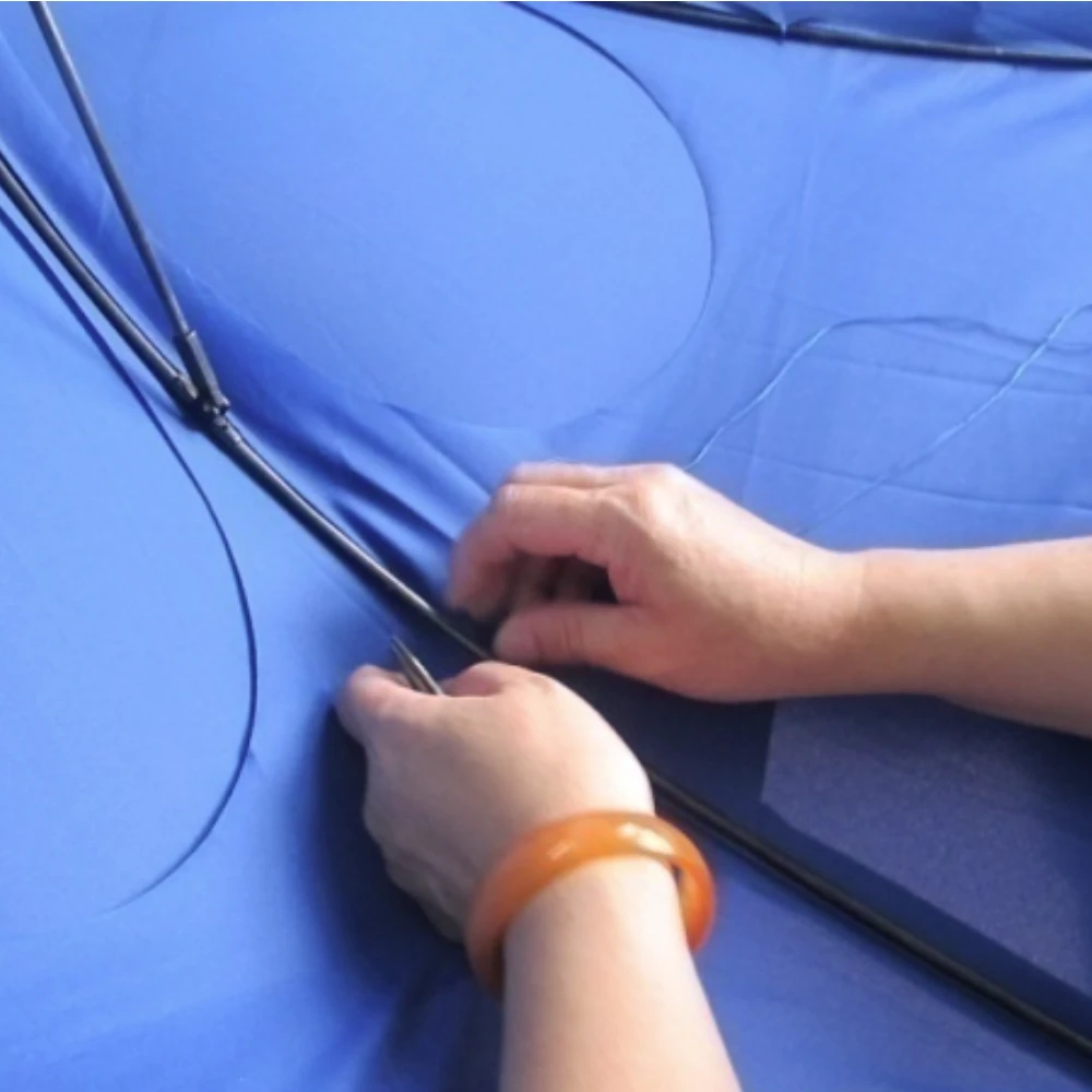 Sewing canopy onto ribs