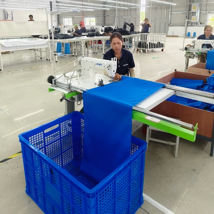 cambodia umbrella sewing workshop