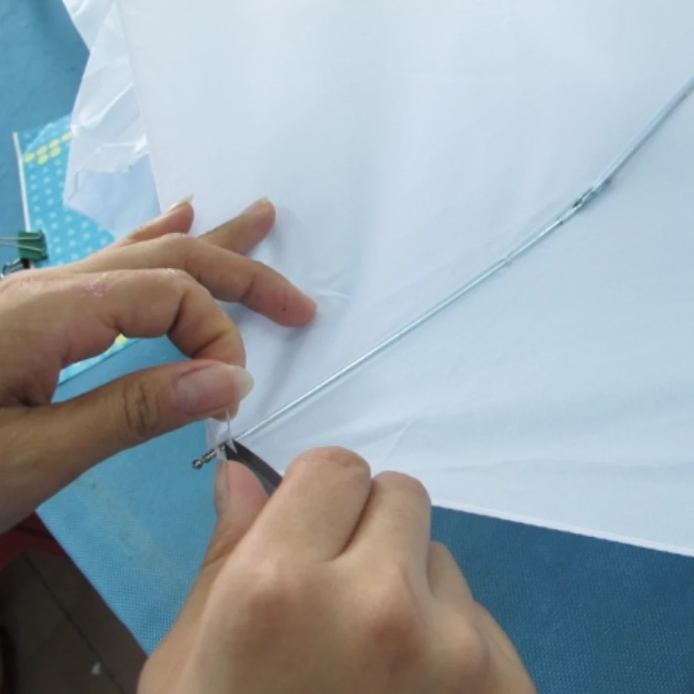 Trim excess threads