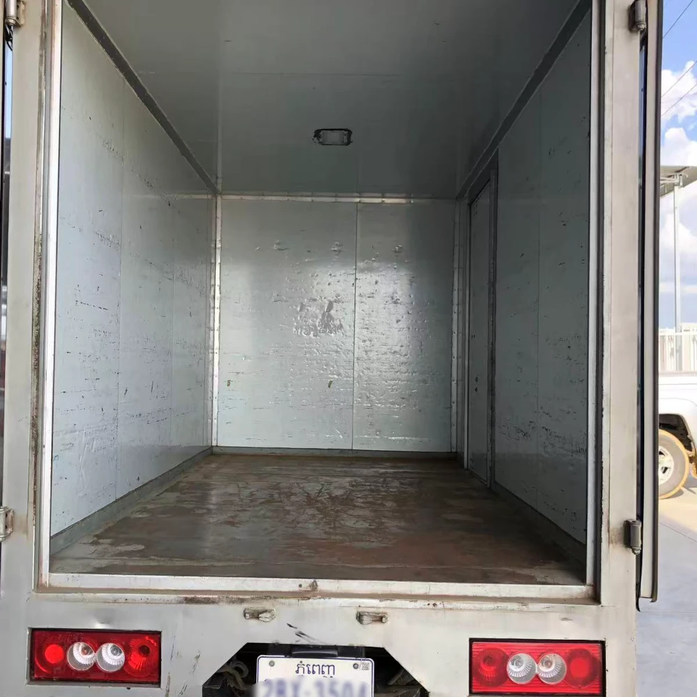 Empty container interior inspection showing dry, clean floor and walls