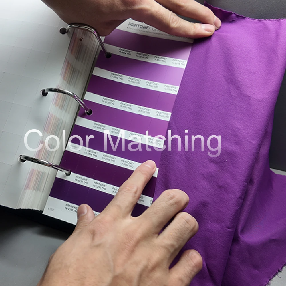 Direct comparison Pantone color reference swatch bulk umbrella fabric quality control